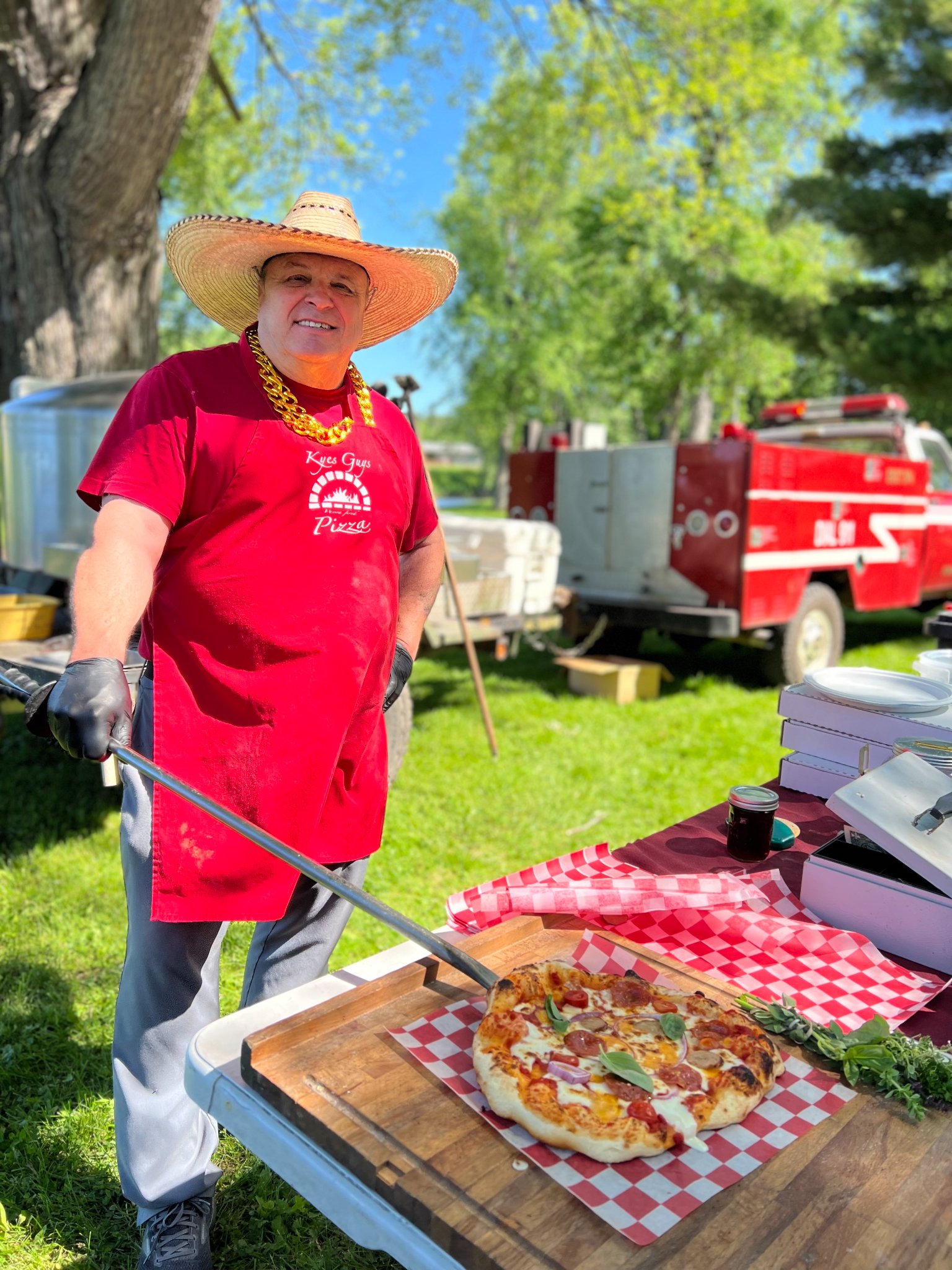 Kyes Guys Pizza owner at an event
